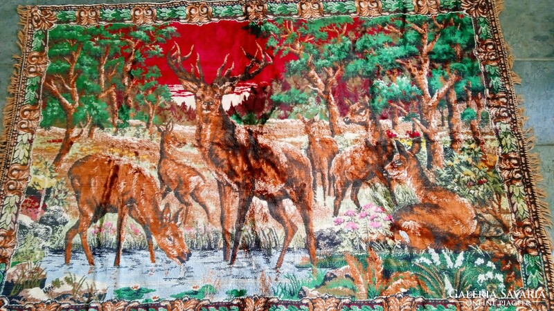 Old silk carpet/wall protector with a deer scene