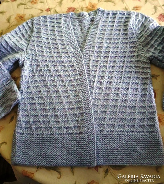 I am selling a hand-knitted warm winter blazer-style hoodie