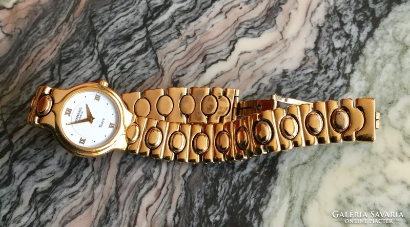Raymond weil tosca marked 9841-2 18 k. I want to sell my gold-plated used watch!