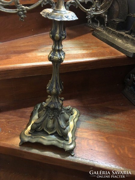 Baroque candle holder made of copper alloy, height 45 cm.