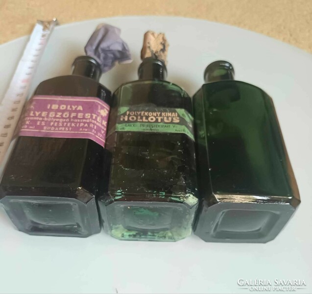 Antique bottles with ink labels