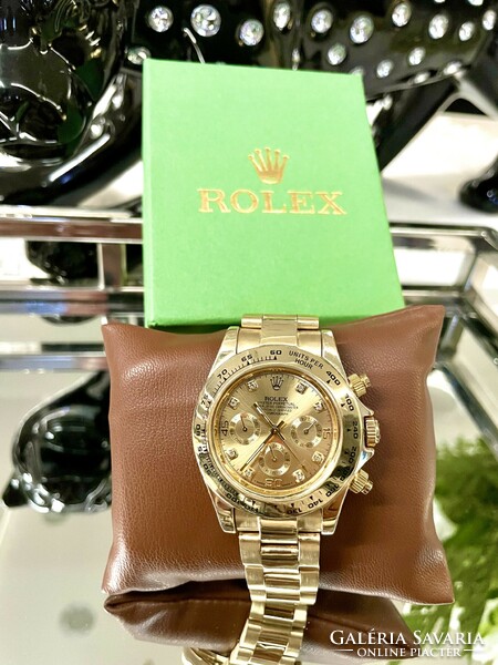 Rolex daytona gold new