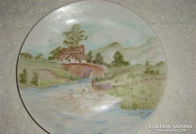 Porcelain decorative plate with a landscape