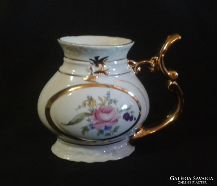Porcelain jug with flower pattern, gilded handle