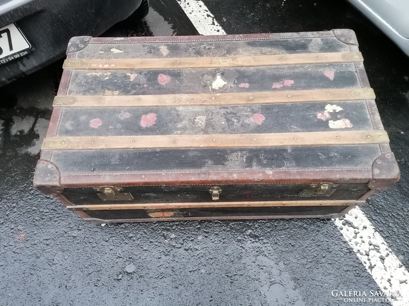 Old large traveling chest with a copper lock, in good condition