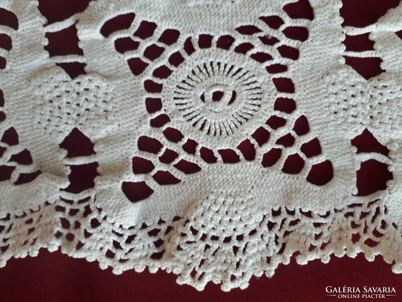 Crocheted lace tablecloth consisting of 8 stars