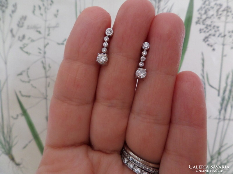 A pair of 18K white gold modern earrings