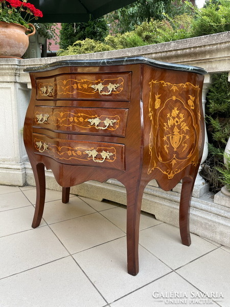 Beautiful graceful chest of drawers with marble top