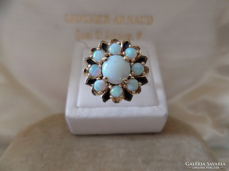 Gold cocktail ring with genuine opals and black enamel