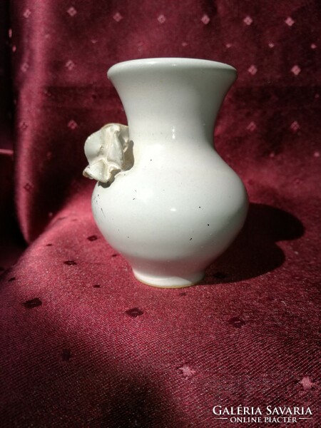 Ceramic vase is small