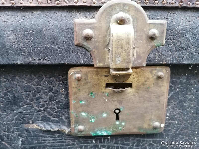 Old large traveling chest with a copper lock, in good condition