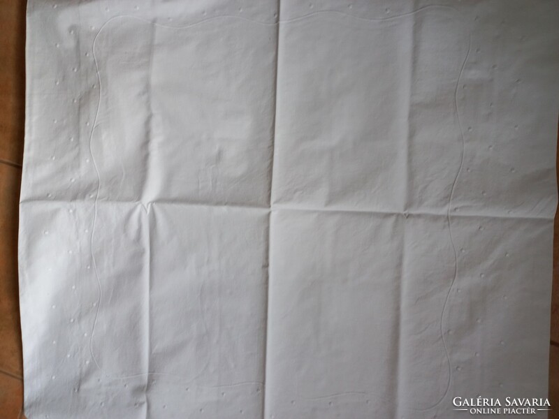 Snow-white, crisp large pillowcase with dotted edges