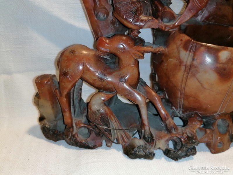 Larger antique soapstone carving with animals