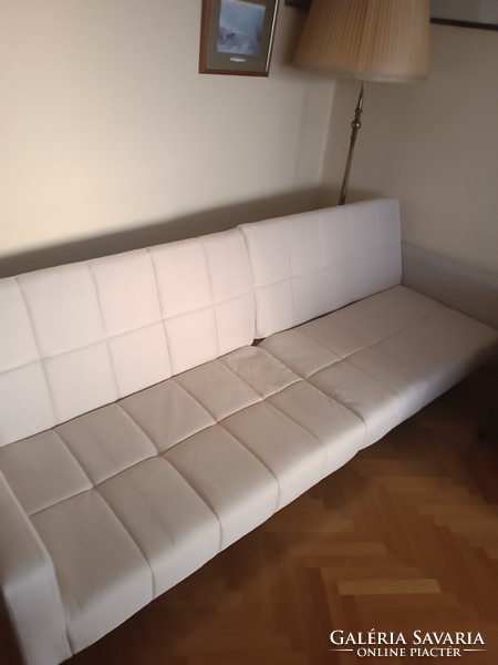 Minimal sofa, guest bed.