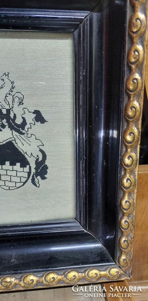 Antique stitched noble family coat of arms framed