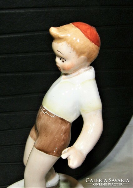 Porcelain figurine of a little boy with a frog, Bodrog Kresztúr?