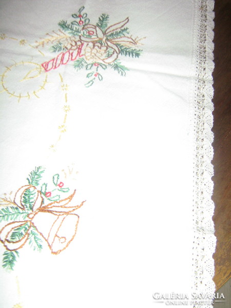Beautiful Christmas hand-embroidered linen tablecloth with a lace edge
