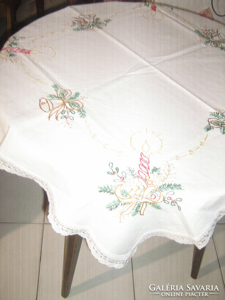 Beautiful Christmas hand-embroidered linen tablecloth with a lace edge