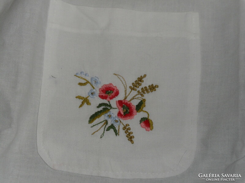 Machine-embroidered white linen apron with poppies