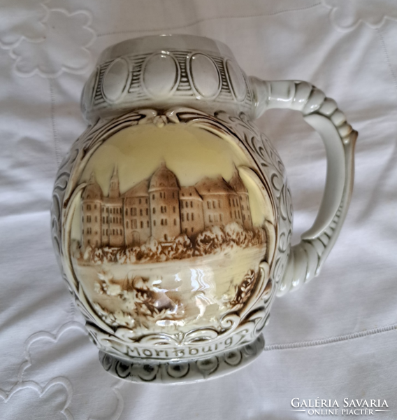 Old faience beer mug