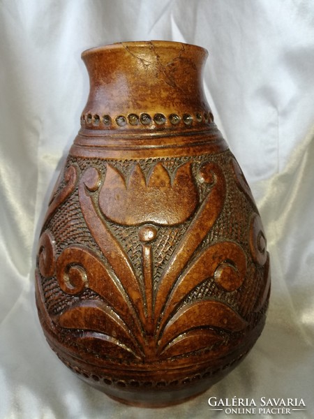 The tulip ceramic vase is damaged
