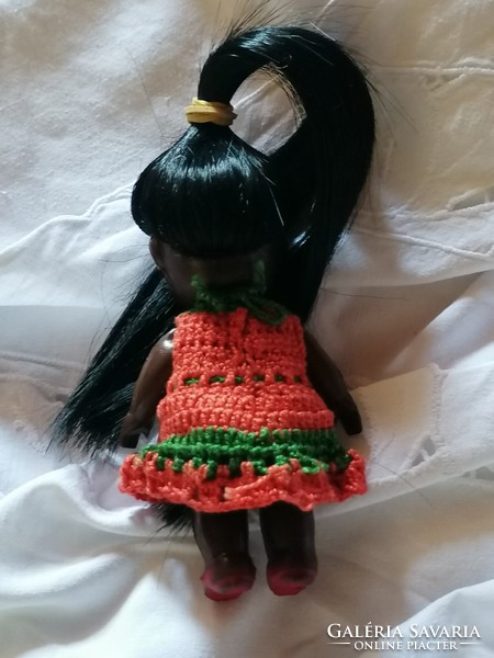 Trafficked Negro doll, with long black hair, from the sixties