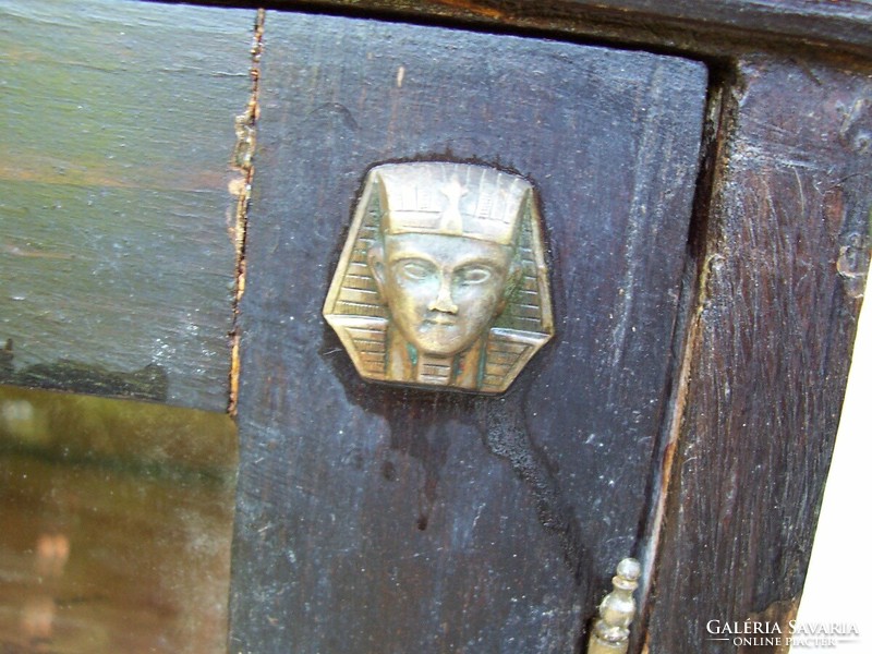 Copper pharaoh head wall cabinet