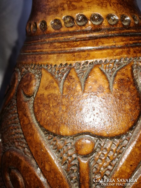The tulip ceramic vase is damaged