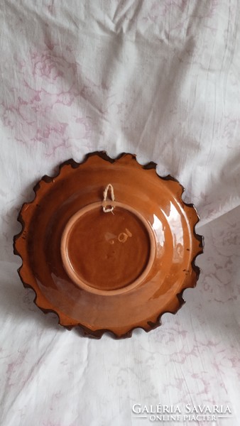 Brown glazed folk decorative plate