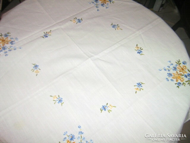 Beautiful hand-embroidered tablecloth with daffodils