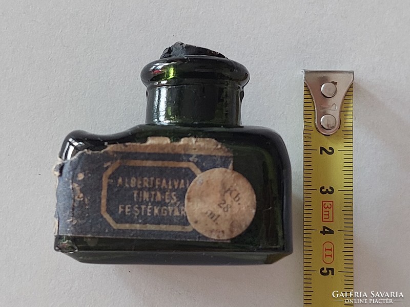 Ink bottle with old ink bottle label