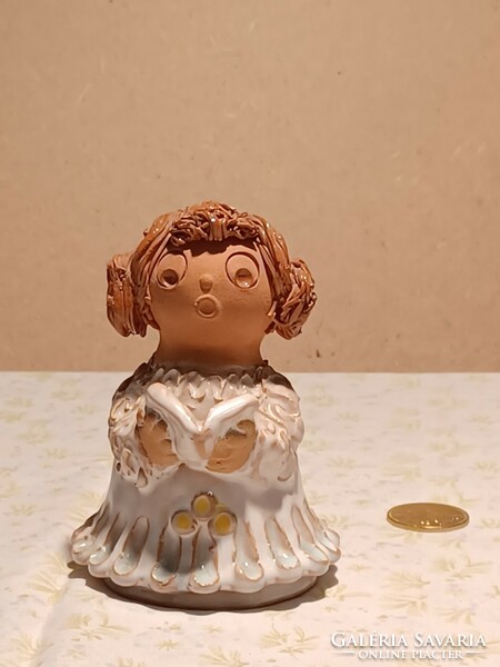 Glazed ceramic chorister girl - marked