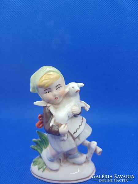 Porcelain girl with lamb