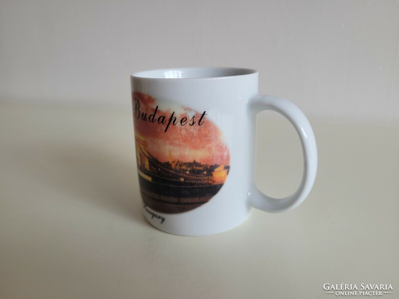 Retro old souvenir mug with the inscription Budapest Hungary with a picture of a chain bridge