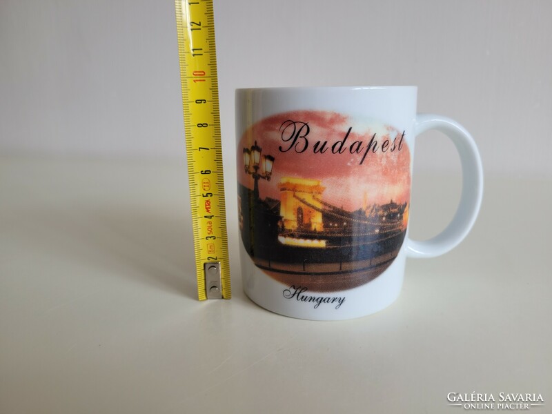 Retro old souvenir mug with the inscription Budapest Hungary with a picture of a chain bridge