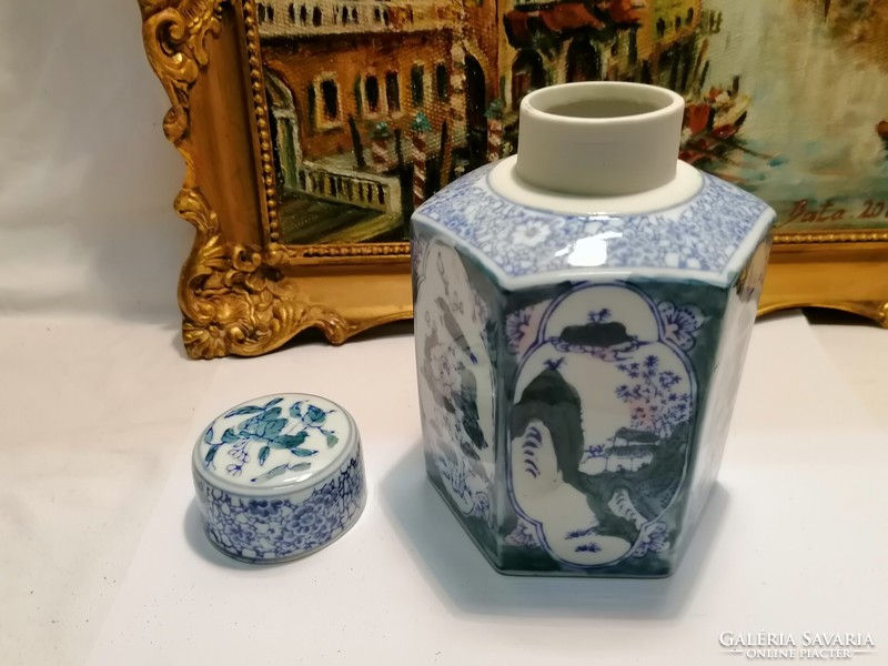 Painted oriental porcelain teapot with lid