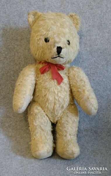 A solidly built, non-sponge, sounding teddy bear from the 1960s