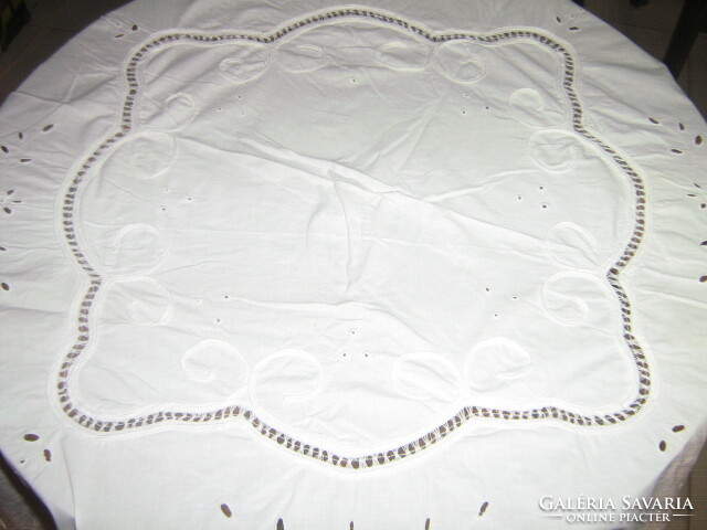 Beautiful madeira and ribbon embroidered snow-white round tablecloth