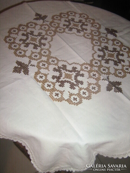 Beautiful light-dark brown cross-stitch embroidery tablecloth with a lace edge