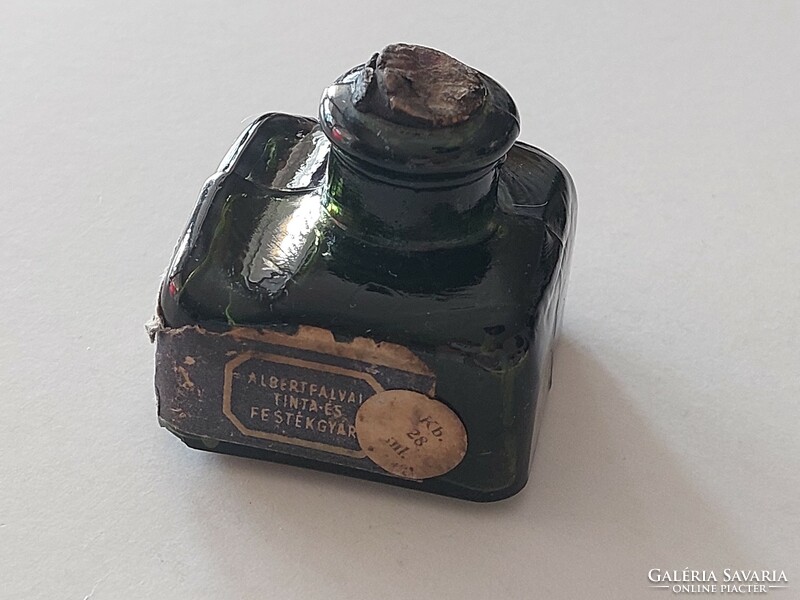 Ink bottle with old ink bottle label