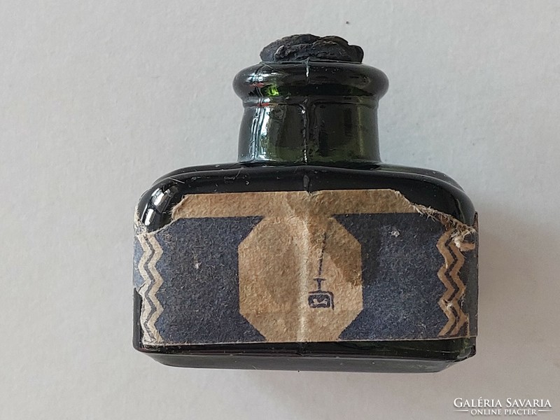 Ink bottle with old ink bottle label