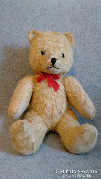 A solidly built, non-sponge, sounding teddy bear from the 1960s