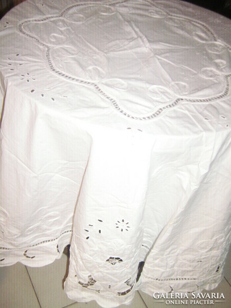 Beautiful madeira and ribbon embroidered snow-white round tablecloth