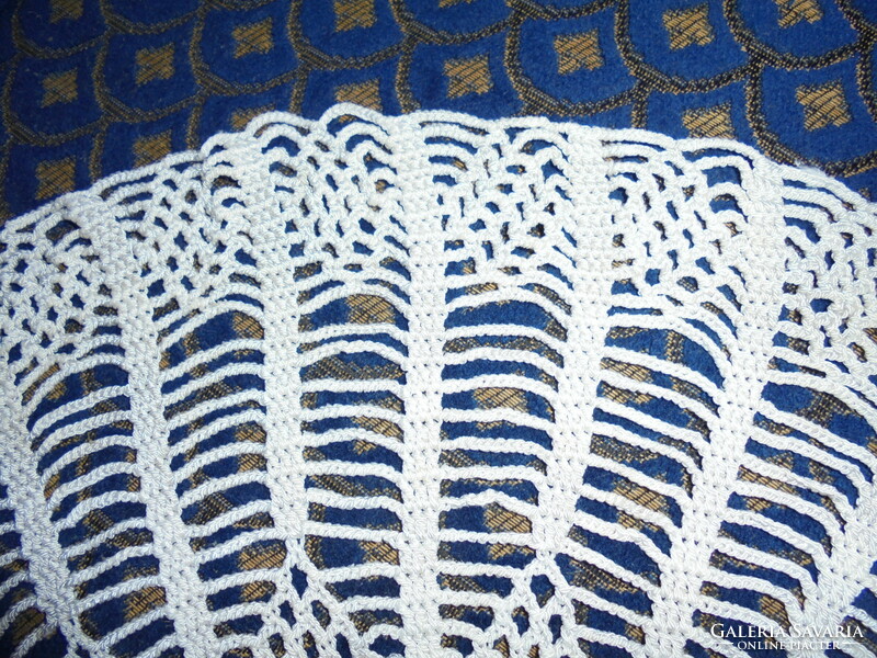 Old crocheted round tablecloth
