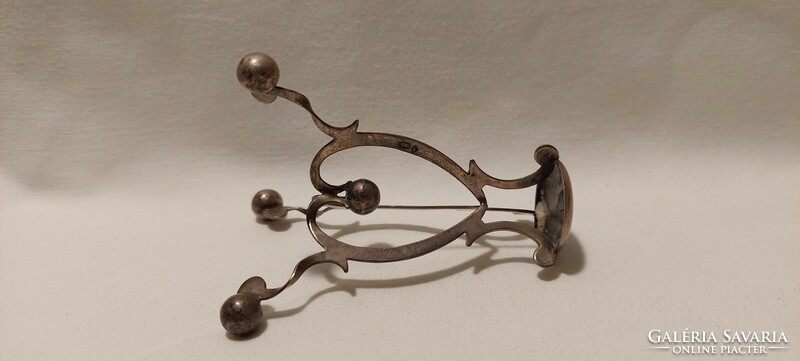 Silver, industrial artist statue holder stand