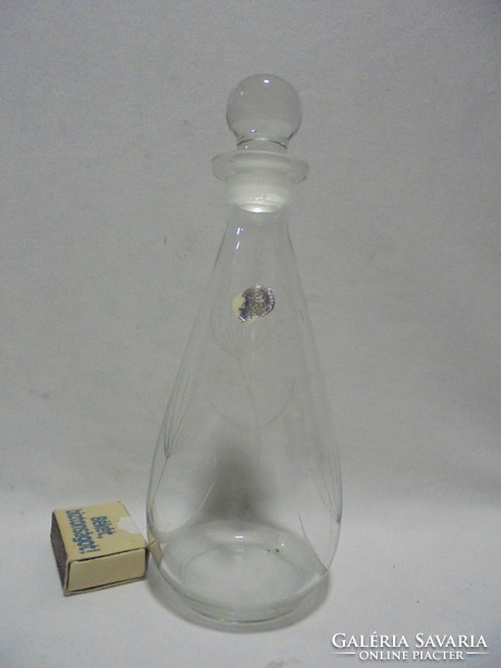 Old glass carafe, liqueur glass, pouring
