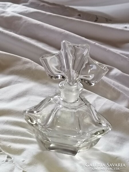 Old decorative perfume bottle with polished glass stopper