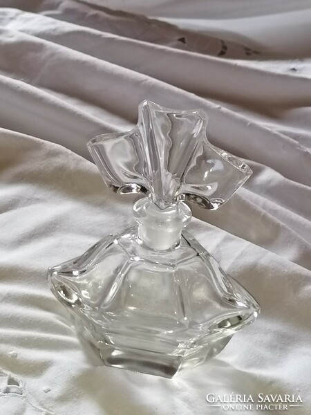 Old decorative perfume bottle with polished glass stopper