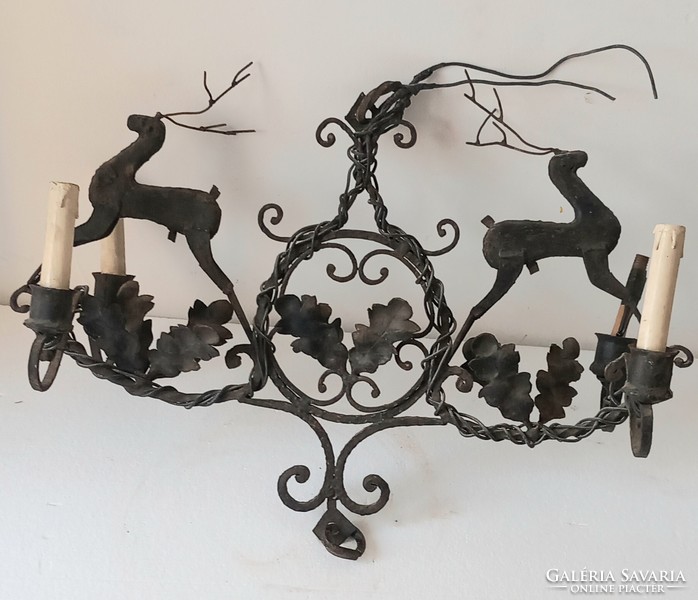 Hunter wrought iron figural ceiling chandelier. Negotiable