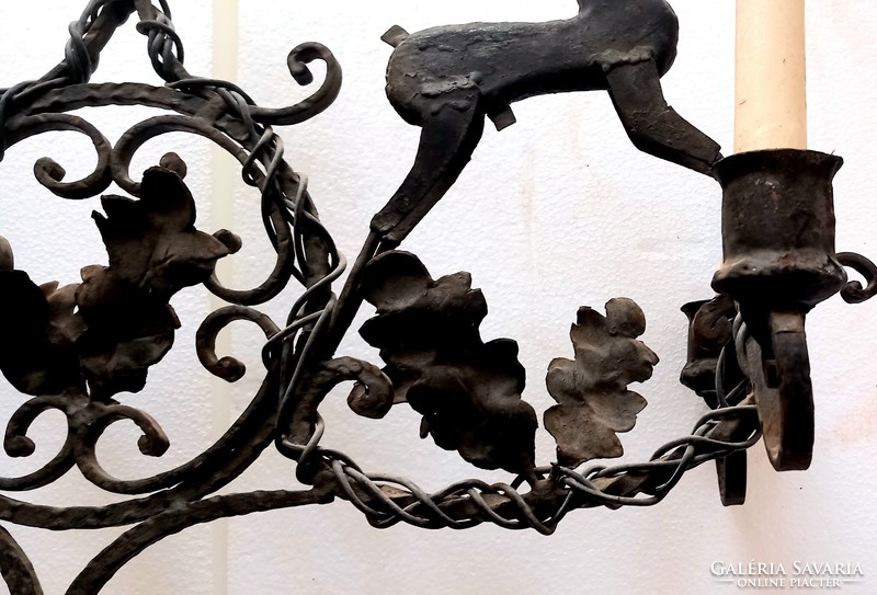 Hunter wrought iron figural ceiling chandelier. Negotiable